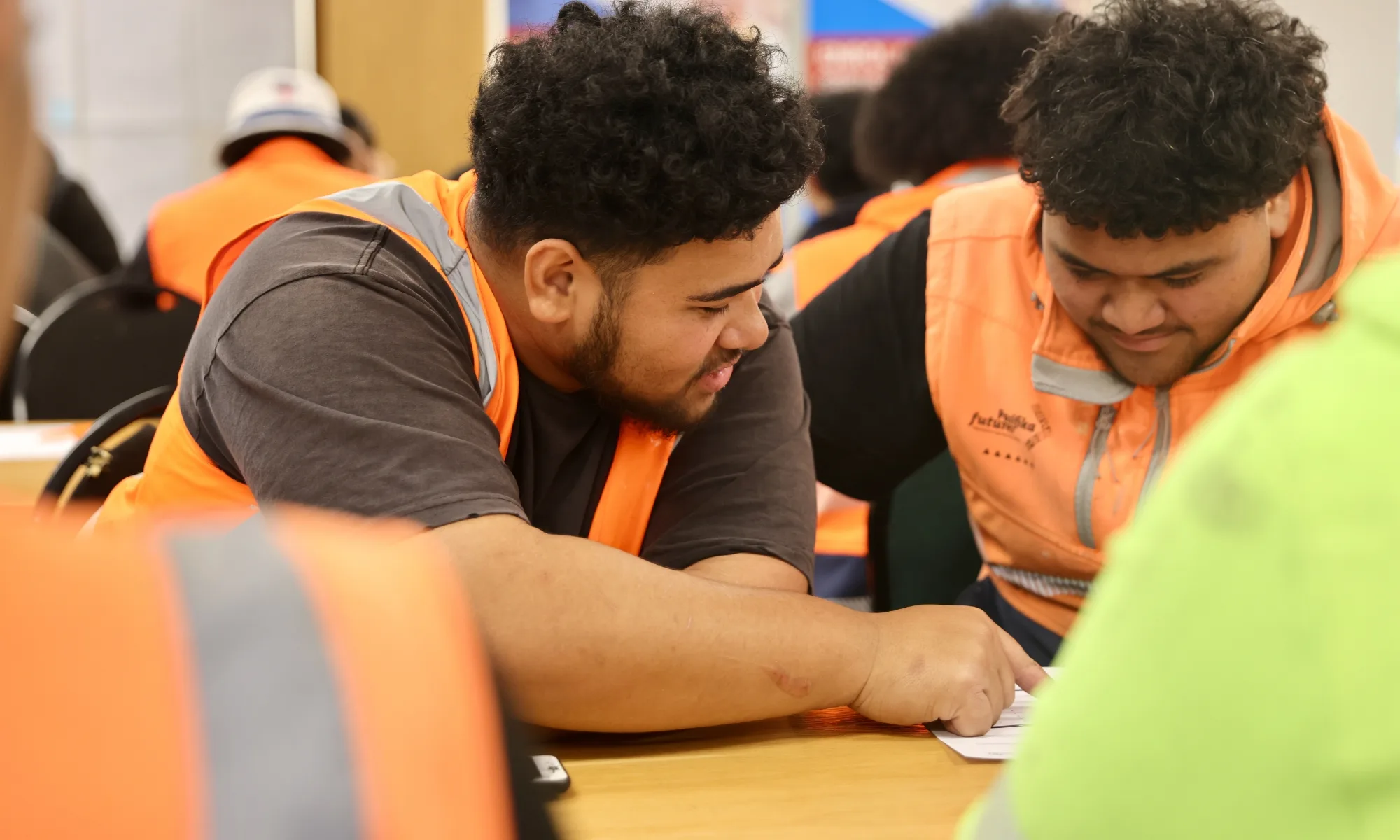 Two students at a desk
